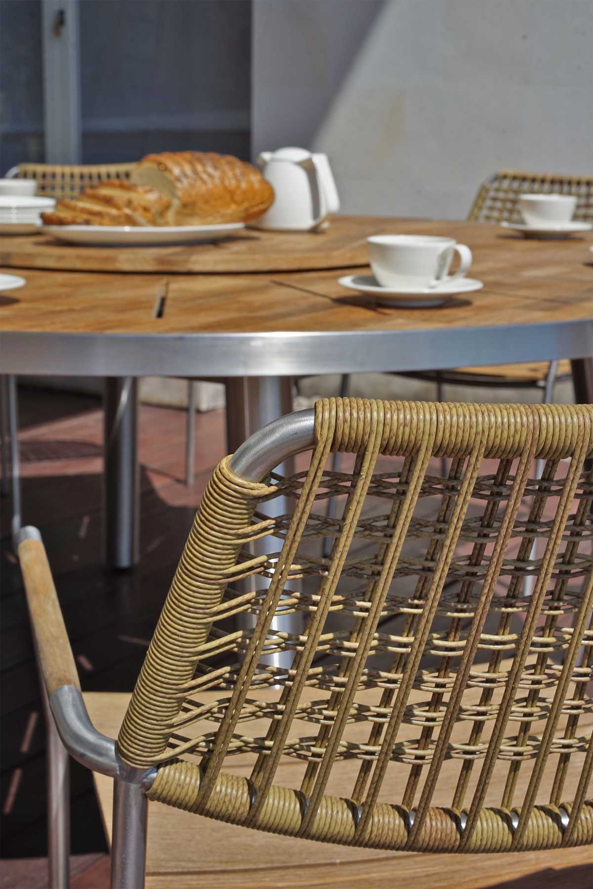 MEIKA_stacking_chair_wicker_round_table_teak_med